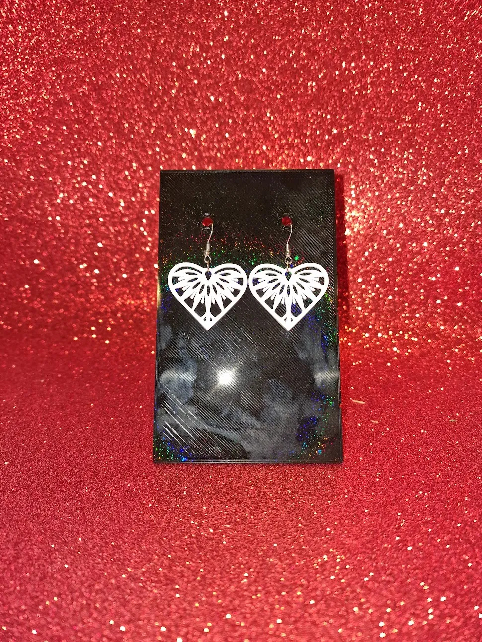 White heart earrings view 2