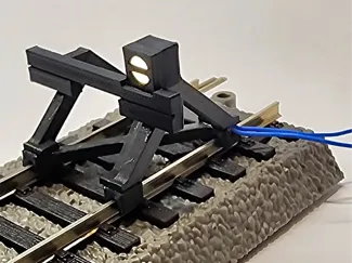 Railway buffer with lighted sign , H0 scale