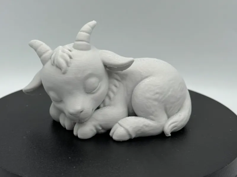 Sleeping Goat – Gentle Resting Pose