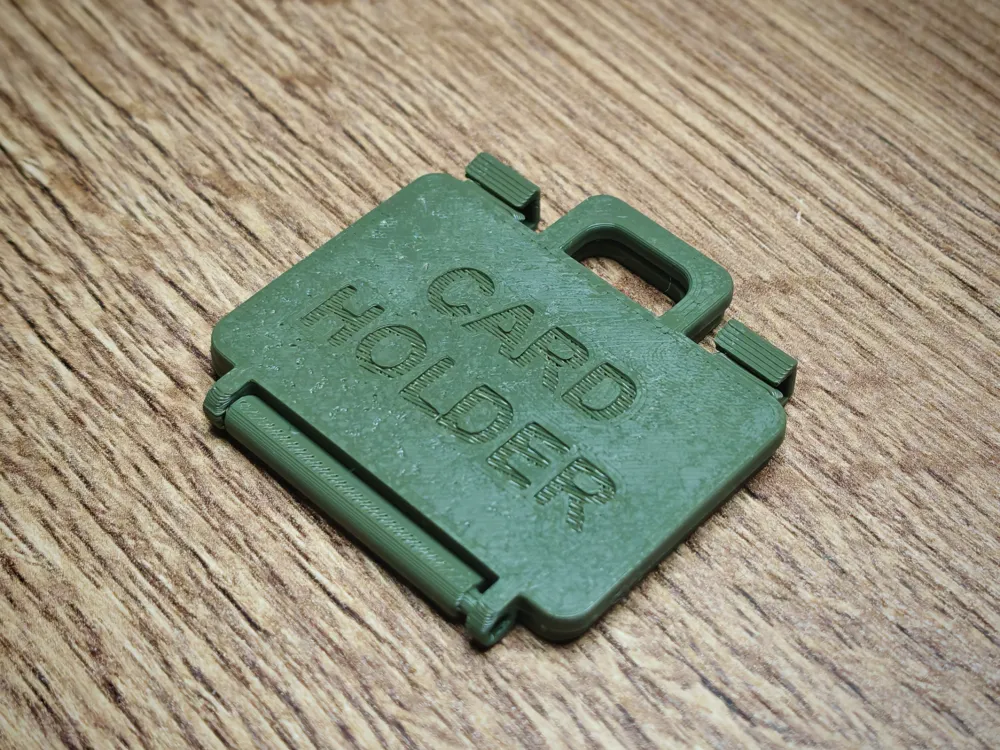 Holder for memory cards and flash drives by 3d print studio MakerWorld