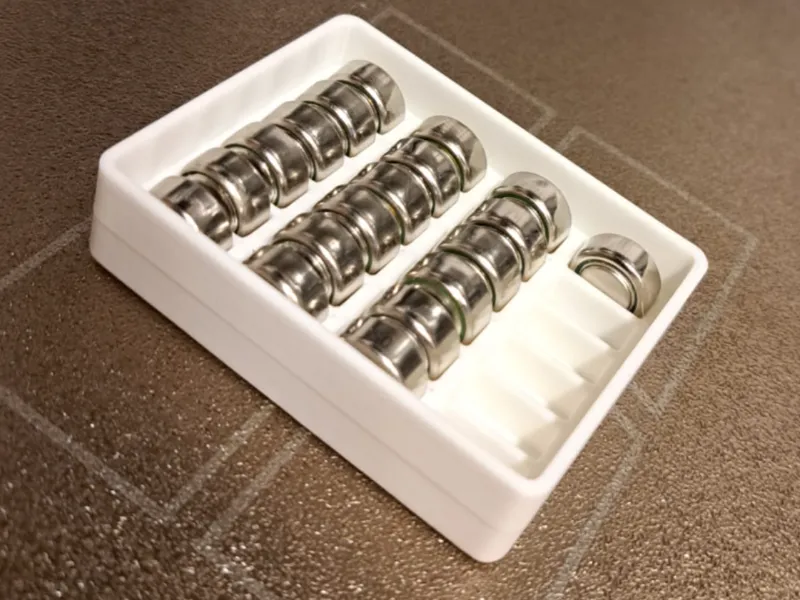 LR44 battery tray