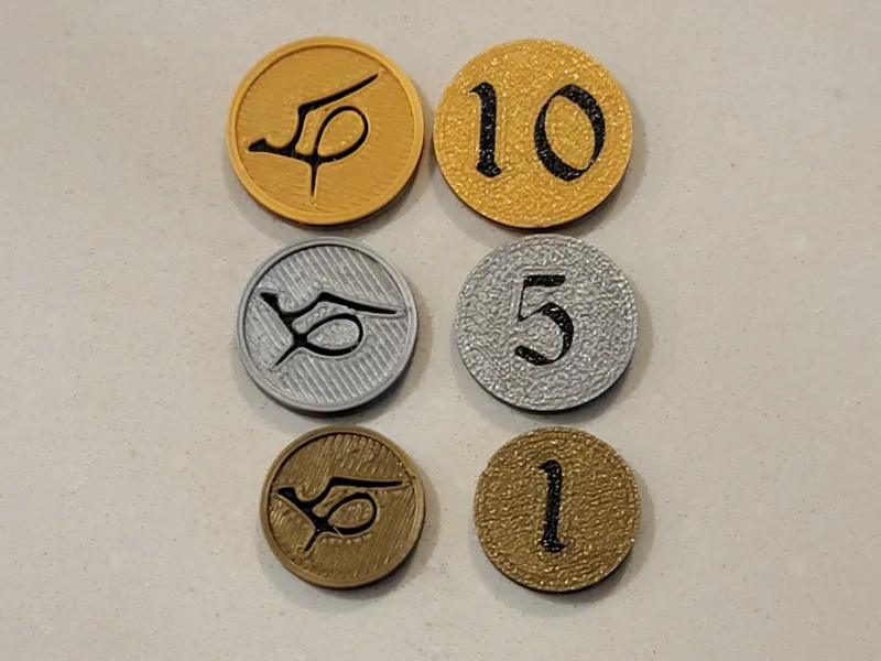 Coins set for Scale: Rise of Dragons card game