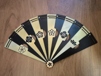 Folding hand fan