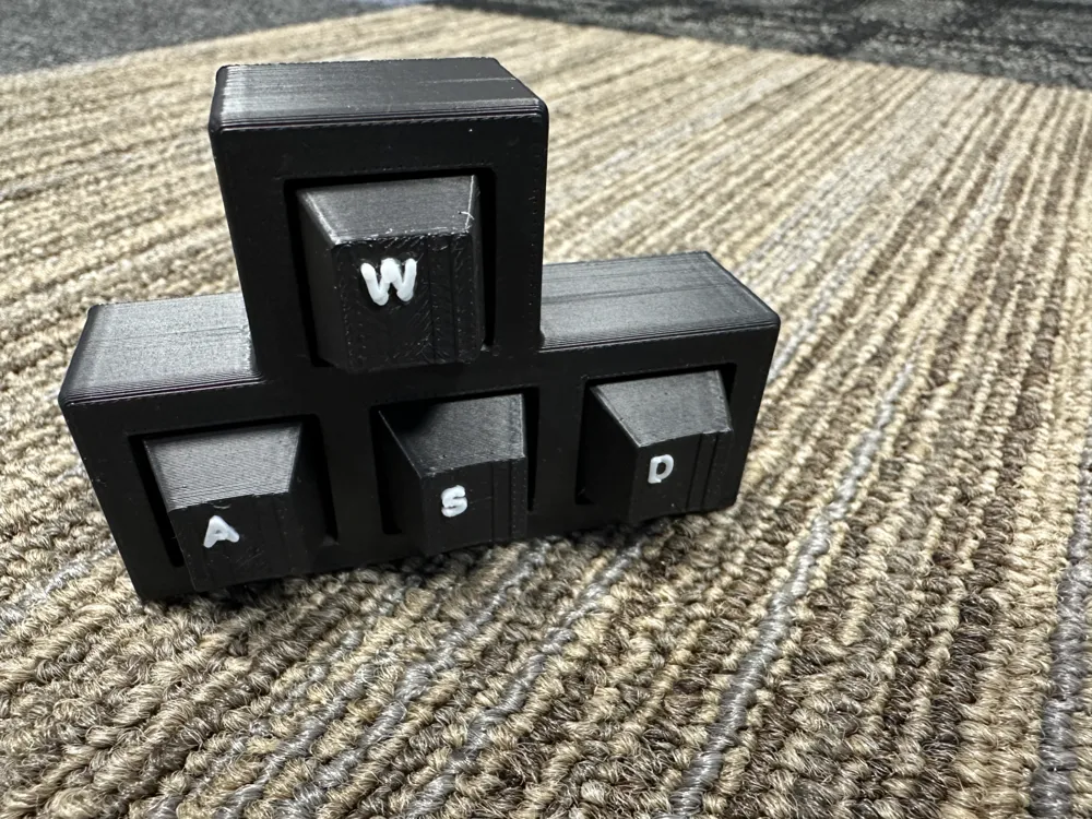 WASD Fidget Key Clicker - Free 3D Print Model - MakerWorld