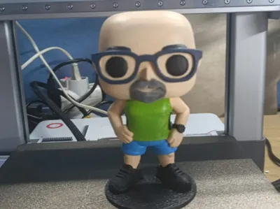 Funko Pop style figure of a sportsman with glasses