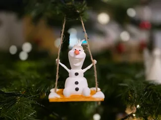 Snowman on swing