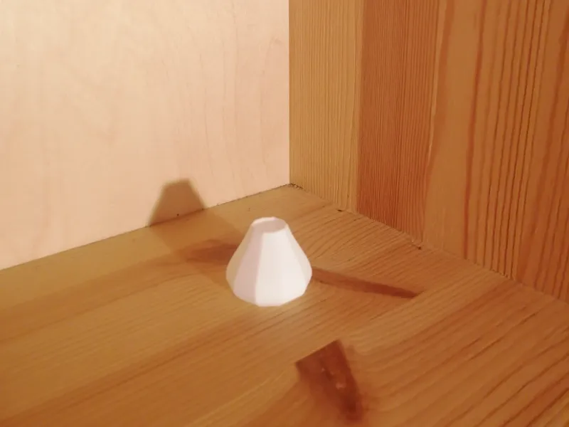 A very small vase / chef hat 