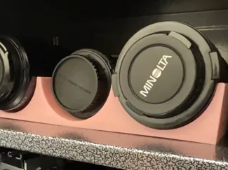 Camera lens holder