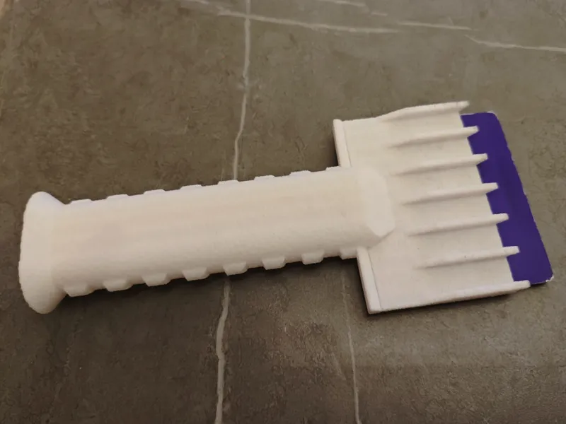 Windscreen scraper 