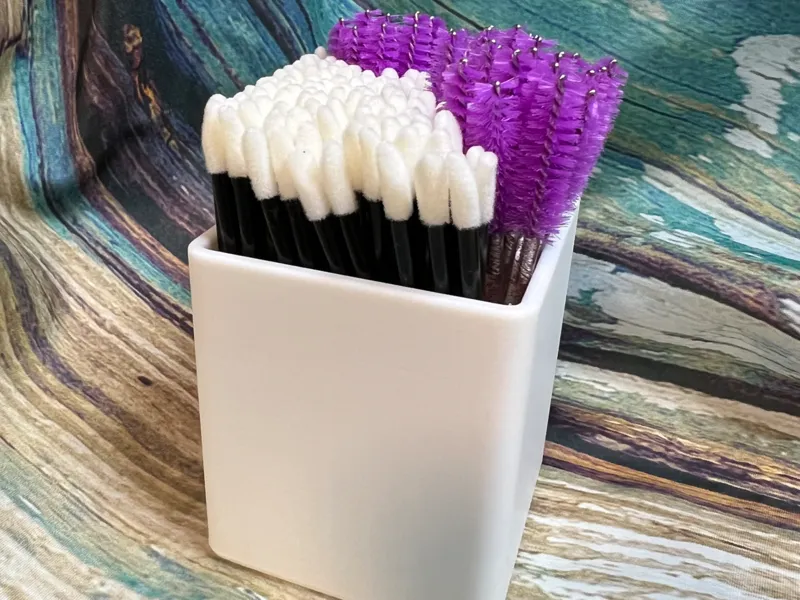 Spoolie and cotton swab holder 