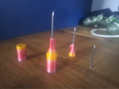 Weighted dart skirt for modular blow gun