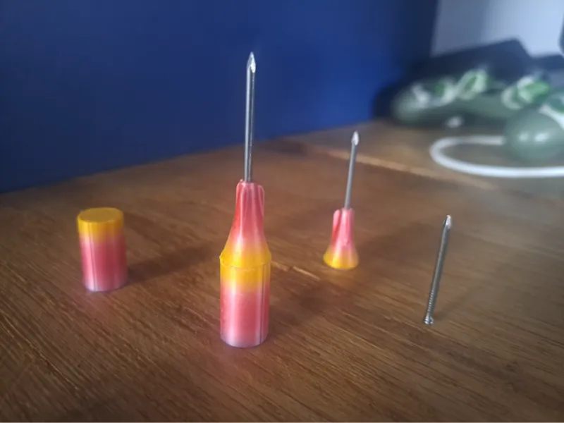 Weighted dart skirt for modular blow gun