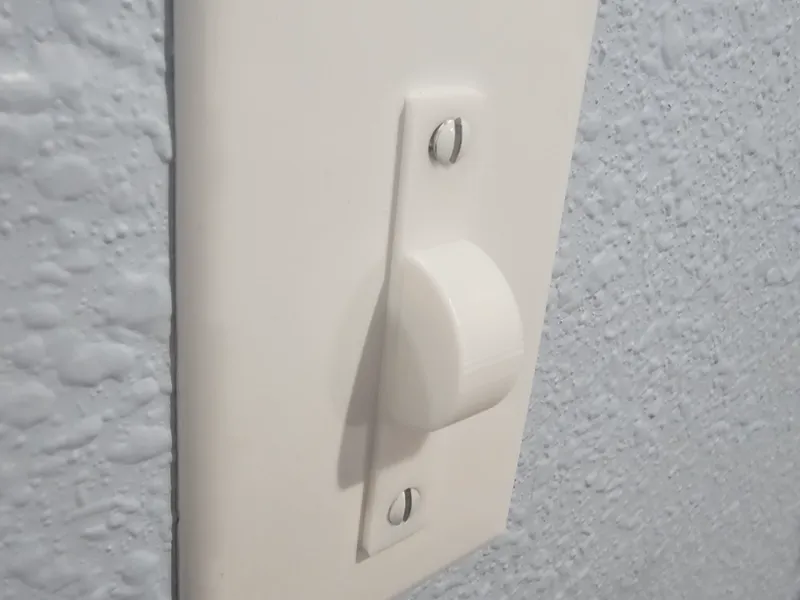 Light switch toggle cover