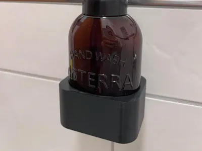 Wall mount for doTERRA soap dispenser