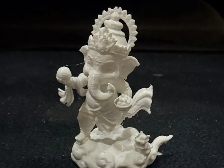 Running Lord Ganesha with Laddu