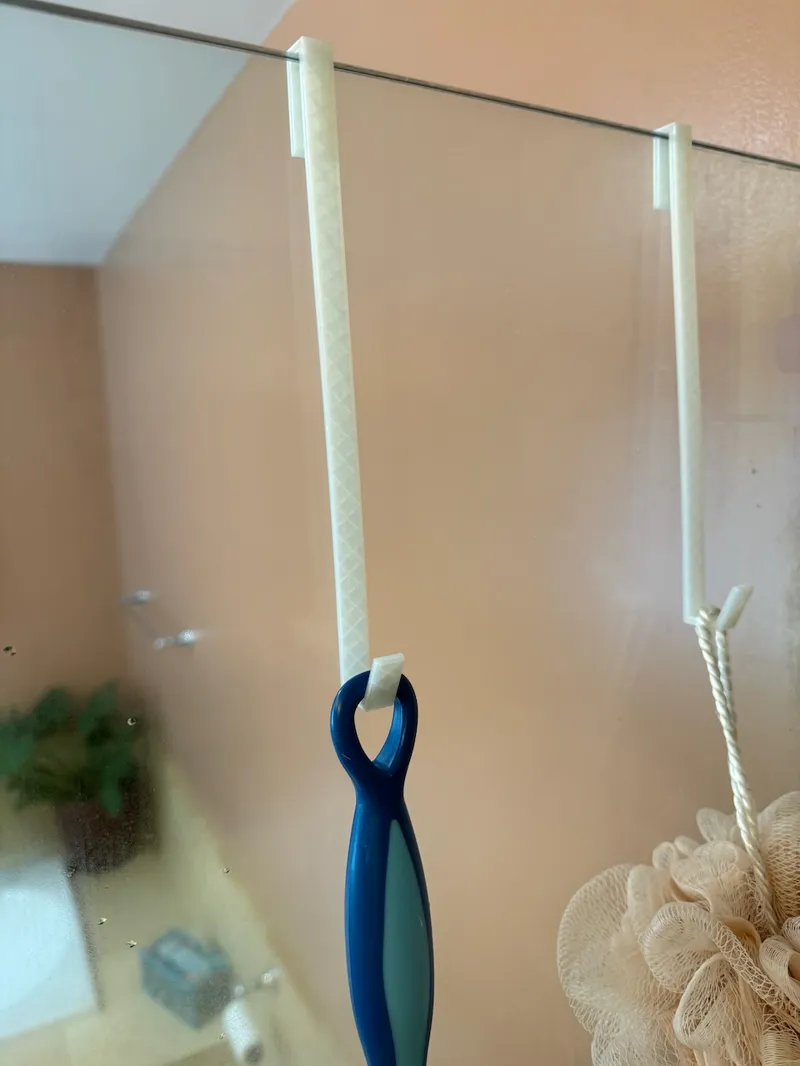 Shower hook for glass shower wall/door