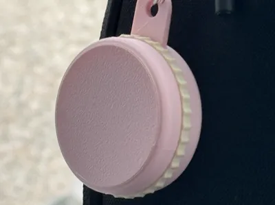 Macaron shaped AirTag / pill holder keychain