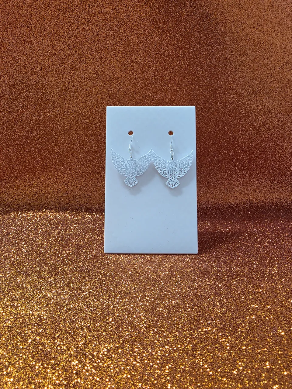 Flying owl earrings view 2