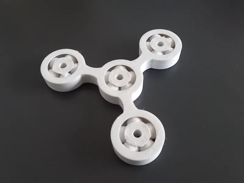 Rotating fidget spinner