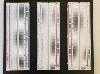 Triple breadboard holder with trays for components
