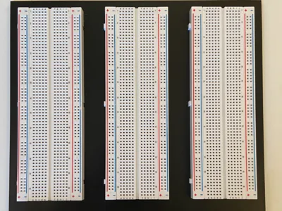 Triple breadboard holder with trays for components