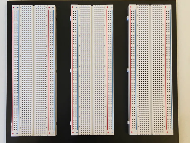 Triple breadboard holder with trays for components