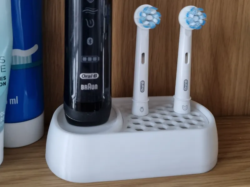 Oral B charger stand with drip tray for two heads