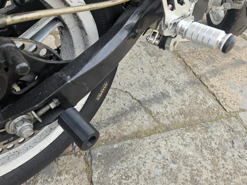 Motorcycle rear roller crash pads