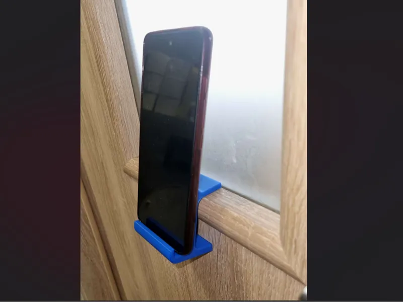 Phone stand for toilet doors