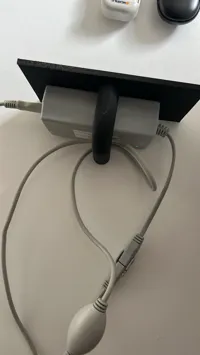 Wall-Mounted Shelf with Curved Retaining Bracket