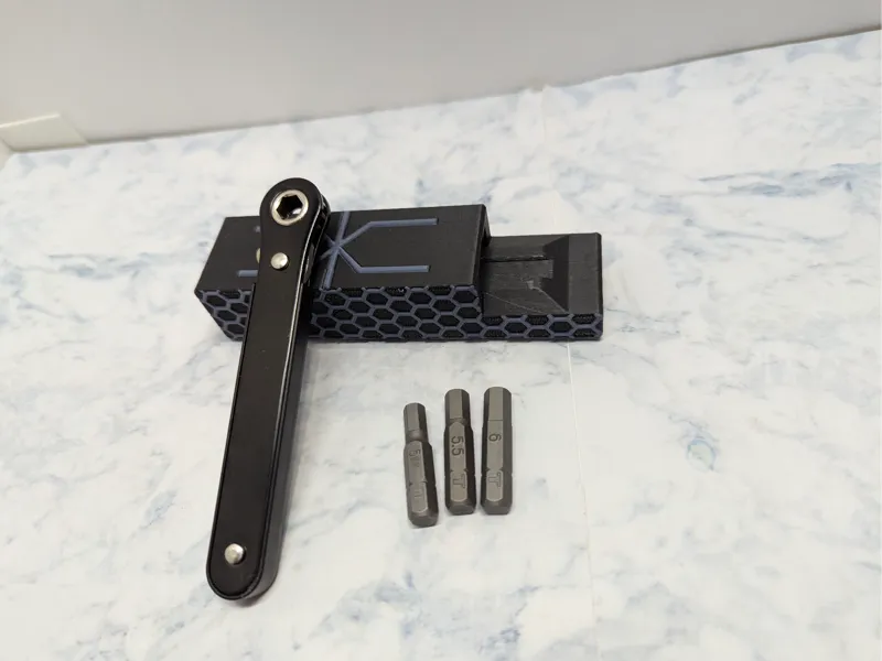 Compact hex driver and holder