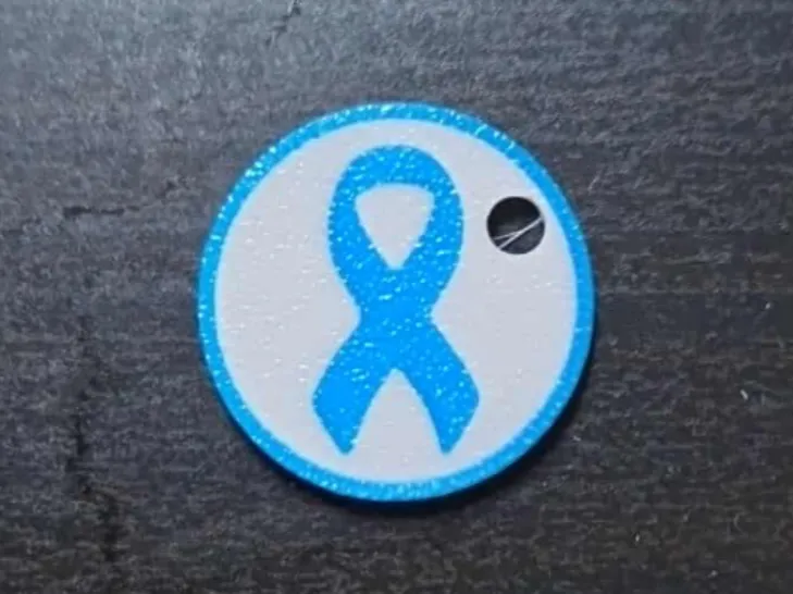 Movember Keychain – 2€ Size 