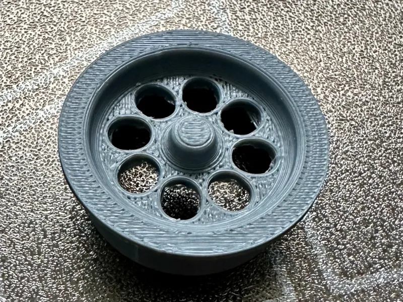 Washroom sink strainer
