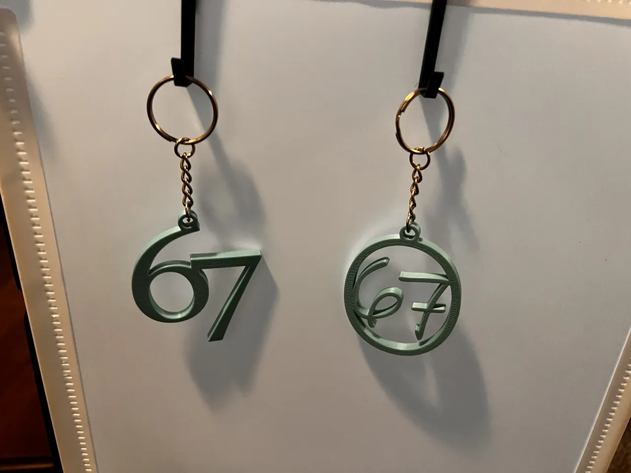 67 earrings, Keychains, and Ornaments view 2