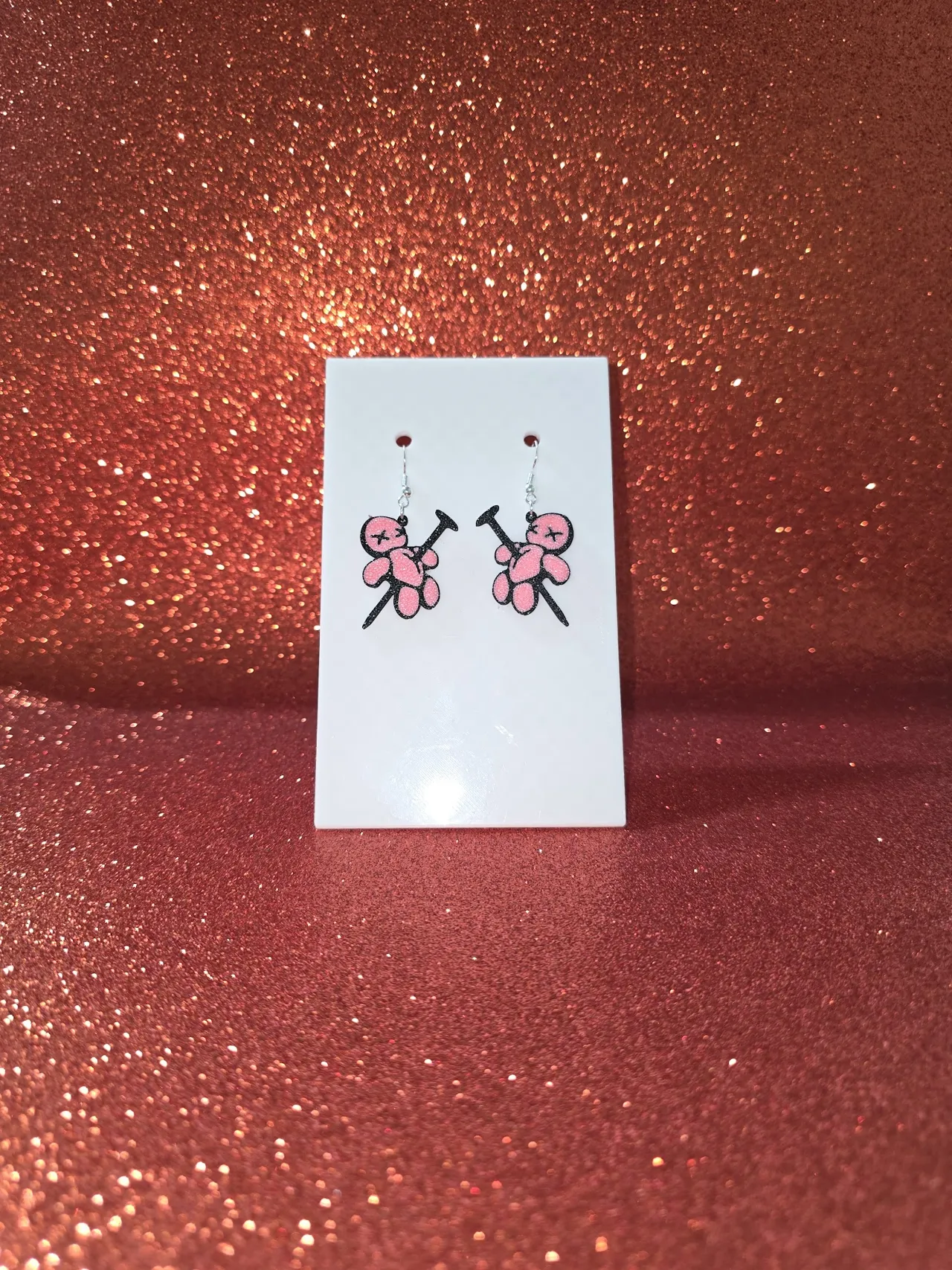 Voodoo doll earrings view 2