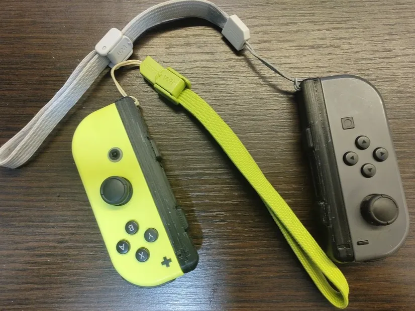 Dragonne Joy-Con avec accès LED et bouton de synchronisation