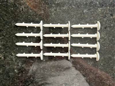 Barbed landscape fabric ground stakes ground pin