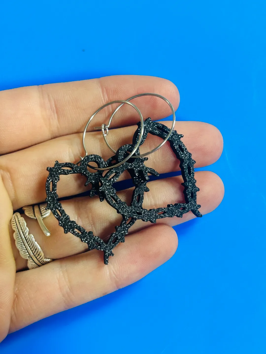 Pendientes corazonistas espina view 2