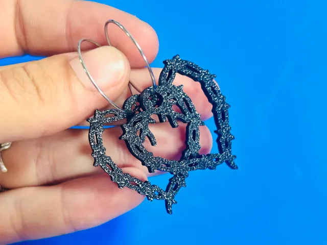Pendientes corazonistas espina