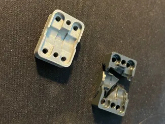 AMS second stage feeder gear plate