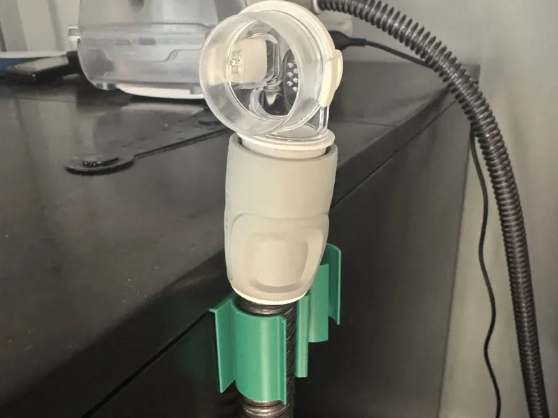 CPAP hose snap in clip hanger