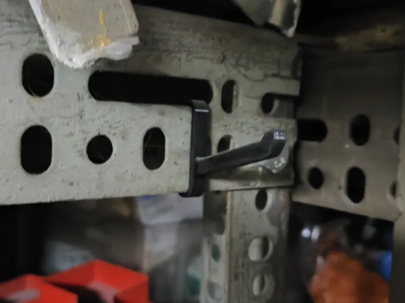 Hook for metal profile