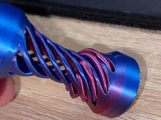 Spiral spinning ball fidget toy