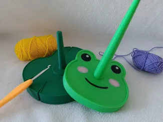 Dévidoir à fil en forme de grenouille