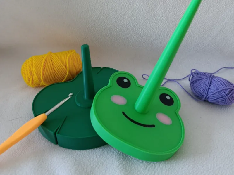 Dévidoir à fil en forme de grenouille