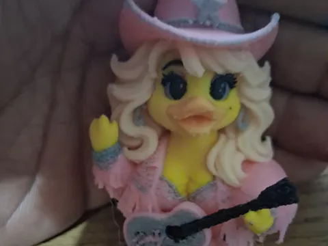 Letrero o emblema decorativo: Dolly Duck — referencia de MakerWorld