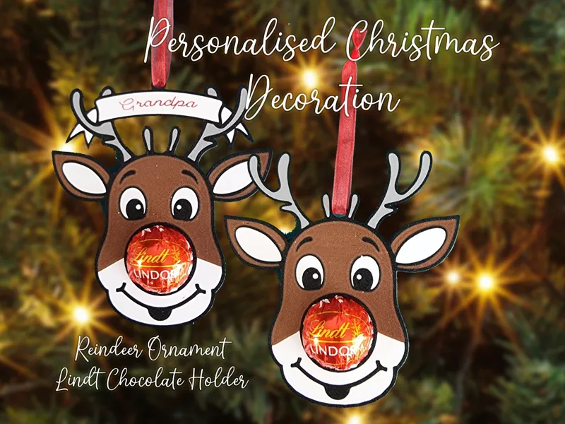 Reindeer chocolate holding Christmas decoration