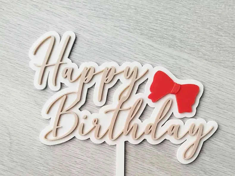 Happy Birthday cake topper with bow