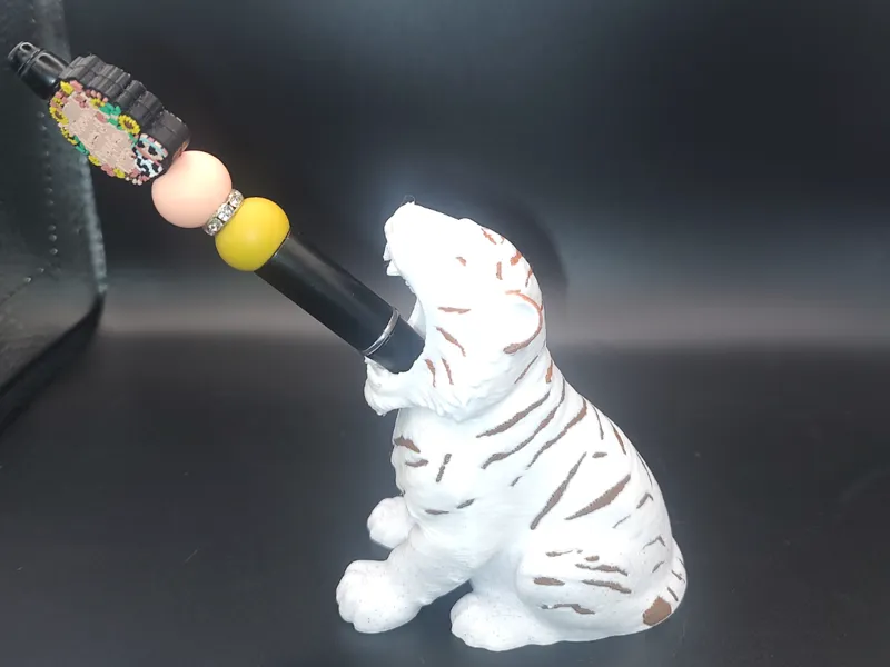 Tiger eating pen