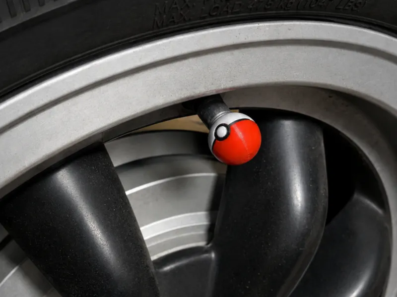 Pokeball valve cap
